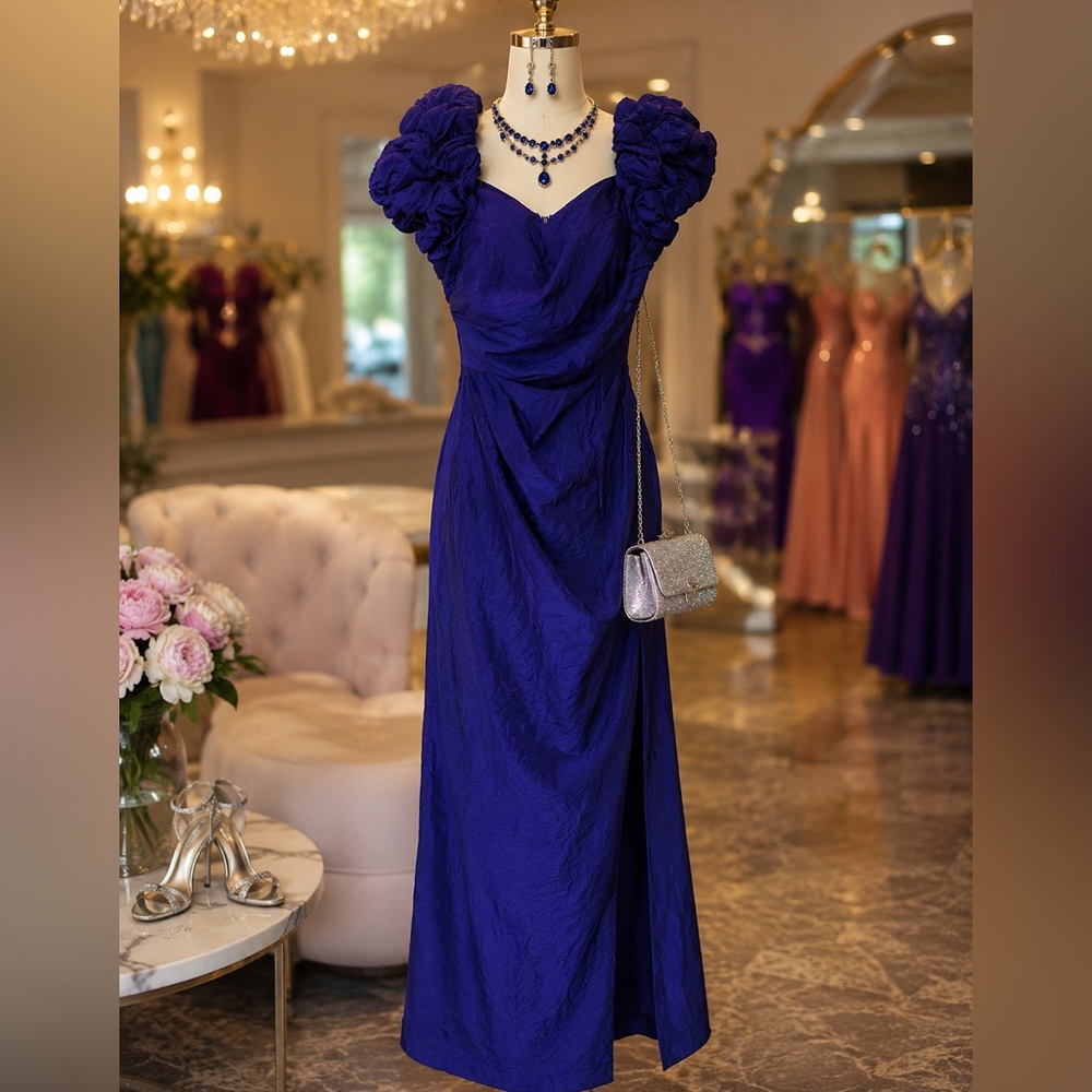 Royal Blue Evening Gown with Puff Shoulder Detail. Fits like a size 4.